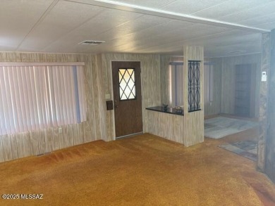 Solid financeable home located in desirable part of the on Tucson Estates Golf Course in Arizona - for sale on GolfHomes.com, golf home, golf lot