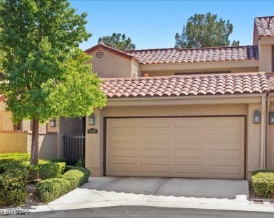 This stunning townhome tucked away in a cul-de-sac in Spanish on Spanish Trail Golf and Country Club in Nevada - for sale on GolfHomes.com, golf home, golf lot