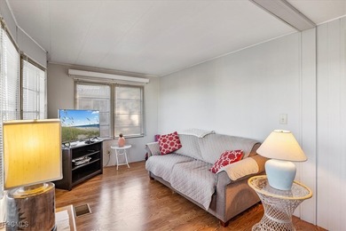 Welcome to this beautiful and spacious home in Tamiami Village on Six Lakes Country Club in Florida - for sale on GolfHomes.com, golf home, golf lot