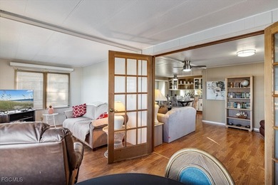 Welcome to this beautiful and spacious home in Tamiami Village on Six Lakes Country Club in Florida - for sale on GolfHomes.com, golf home, golf lot