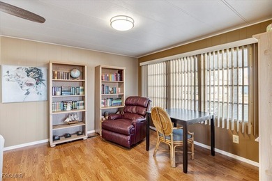 Welcome to this beautiful and spacious home in Tamiami Village on Six Lakes Country Club in Florida - for sale on GolfHomes.com, golf home, golf lot