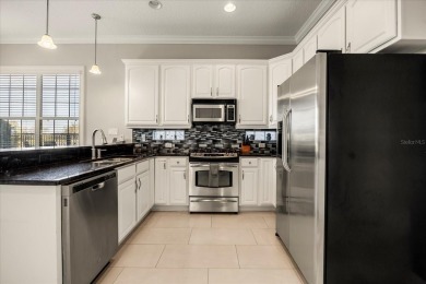 Under contract-accepting backup offers. *Active Reunion Club on ChampionsGate Golf Resort in Florida - for sale on GolfHomes.com, golf home, golf lot