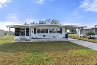 Charming 2-Bedroom, 2-Bath Manufactured Home with Prime Golf on High Point Golf Club, Inc. in Florida - for sale on GolfHomes.com, golf home, golf lot