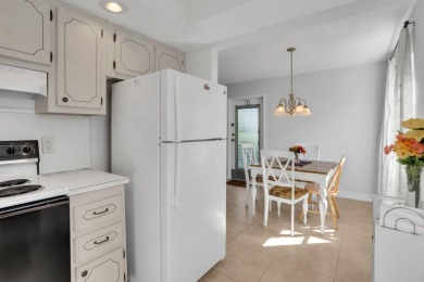 Welcome home to this charming first-floor corner 2-bedroom on Kings Point Golf - Executive in Florida - for sale on GolfHomes.com, golf home, golf lot