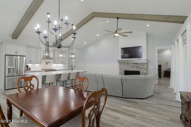 Step into this nearly new home where thoughtful design and on Brunswick Plantation and Golf Resorts in North Carolina - for sale on GolfHomes.com, golf home, golf lot