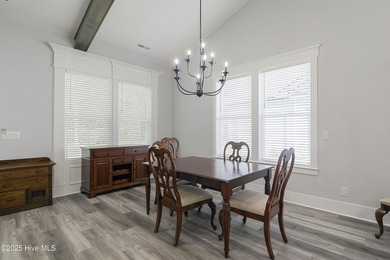 Step into this nearly new home where thoughtful design and on Brunswick Plantation and Golf Resorts in North Carolina - for sale on GolfHomes.com, golf home, golf lot