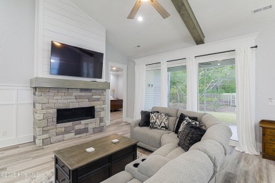 Step into this nearly new home where thoughtful design and on Brunswick Plantation and Golf Resorts in North Carolina - for sale on GolfHomes.com, golf home, golf lot
