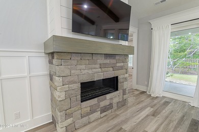 Step into this nearly new home where thoughtful design and on Brunswick Plantation and Golf Resorts in North Carolina - for sale on GolfHomes.com, golf home, golf lot