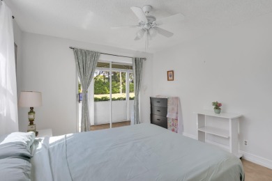 Welcome home to this charming first-floor corner 2-bedroom on Kings Point Golf - Executive in Florida - for sale on GolfHomes.com, golf home, golf lot