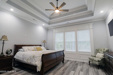 Step into this nearly new home where thoughtful design and on Brunswick Plantation and Golf Resorts in North Carolina - for sale on GolfHomes.com, golf home, golf lot