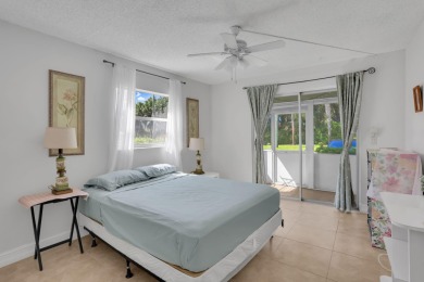 Welcome home to this charming first-floor corner 2-bedroom on Kings Point Golf - Executive in Florida - for sale on GolfHomes.com, golf home, golf lot