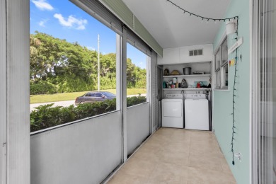 Welcome home to this charming first-floor corner 2-bedroom on Kings Point Golf - Executive in Florida - for sale on GolfHomes.com, golf home, golf lot