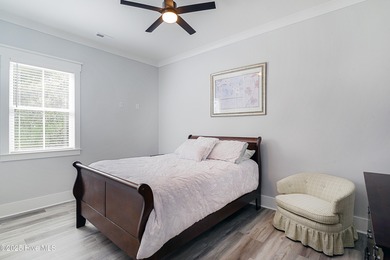 Step into this nearly new home where thoughtful design and on Brunswick Plantation and Golf Resorts in North Carolina - for sale on GolfHomes.com, golf home, golf lot