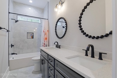 Step into this nearly new home where thoughtful design and on Brunswick Plantation and Golf Resorts in North Carolina - for sale on GolfHomes.com, golf home, golf lot