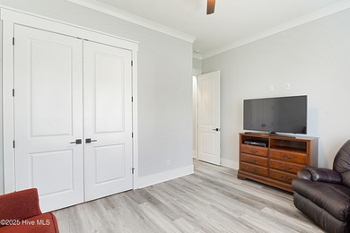 Step into this nearly new home where thoughtful design and on Brunswick Plantation and Golf Resorts in North Carolina - for sale on GolfHomes.com, golf home, golf lot