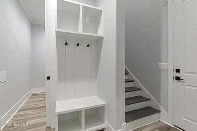 Step into this nearly new home where thoughtful design and on Brunswick Plantation and Golf Resorts in North Carolina - for sale on GolfHomes.com, golf home, golf lot