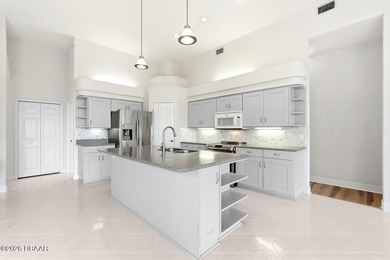 Stunning 4 bedroom, 3 bath POOL home located in the prestigious on The Club At Pelican Bay - North Course in Florida - for sale on GolfHomes.com, golf home, golf lot