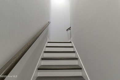 Step into this nearly new home where thoughtful design and on Brunswick Plantation and Golf Resorts in North Carolina - for sale on GolfHomes.com, golf home, golf lot