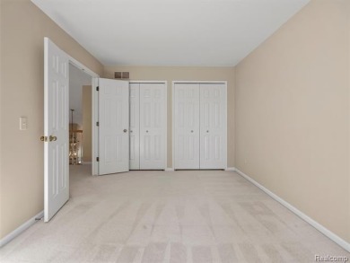 MAIN FLOOR LIVING in THE HEATHERS! This spacious condo offers a on The Heathers Club in Michigan - for sale on GolfHomes.com, golf home, golf lot
