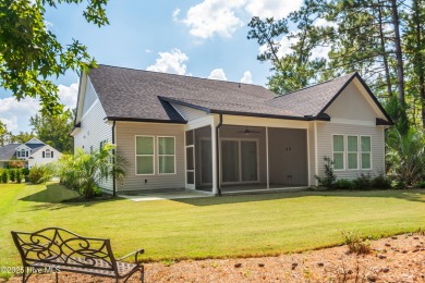 Step into this nearly new home where thoughtful design and on Brunswick Plantation and Golf Resorts in North Carolina - for sale on GolfHomes.com, golf home, golf lot