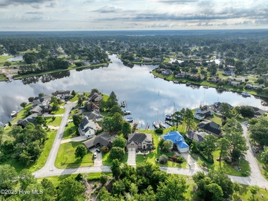 Welcome to this stunning home in Fairfield Harbour, a premier on Harbour Point Golf Club in North Carolina - for sale on GolfHomes.com, golf home, golf lot