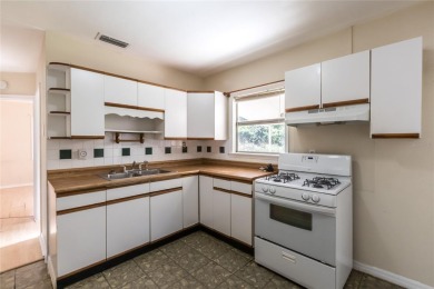 Under contract-accepting backup offers. Charming Home in on River Hills Country Club in Florida - for sale on GolfHomes.com, golf home, golf lot