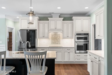 Welcome to this beautifully crafted stick-built home (not on Compass Pointe Golf Course in North Carolina - for sale on GolfHomes.com, golf home, golf lot