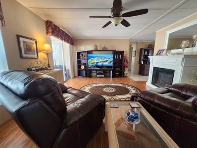 Exquisitely FURNISHED 2 Bedroom, 2 Bath home has all the charm! on Grasslands Golf and Country Club in Florida - for sale on GolfHomes.com, golf home, golf lot