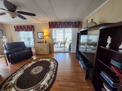 Exquisitely FURNISHED 2 Bedroom, 2 Bath home has all the charm! on Grasslands Golf and Country Club in Florida - for sale on GolfHomes.com, golf home, golf lot