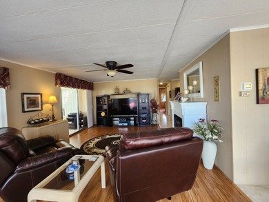 Exquisitely FURNISHED 2 Bedroom, 2 Bath home has all the charm! on Grasslands Golf and Country Club in Florida - for sale on GolfHomes.com, golf home, golf lot