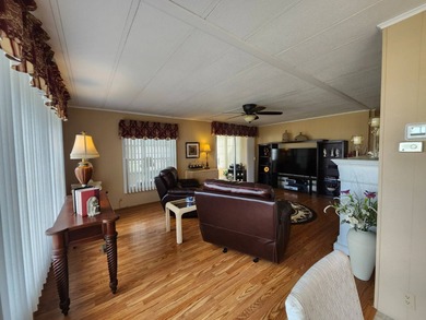 Exquisitely FURNISHED 2 Bedroom, 2 Bath home has all the charm! on Grasslands Golf and Country Club in Florida - for sale on GolfHomes.com, golf home, golf lot