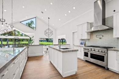 Enveloped within the beauty of its natural setting and defined on Seagate Country Club in Florida - for sale on GolfHomes.com, golf home, golf lot