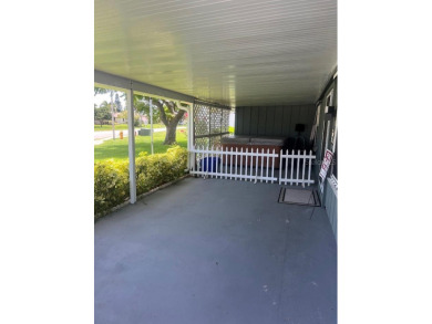 Cute 2 bedroom, 2 bath 1/2 duplex.  Great investment or full on Hidden Lakes Golf Club in Florida - for sale on GolfHomes.com, golf home, golf lot