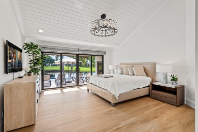 Enveloped within the beauty of its natural setting and defined on Seagate Country Club in Florida - for sale on GolfHomes.com, golf home, golf lot