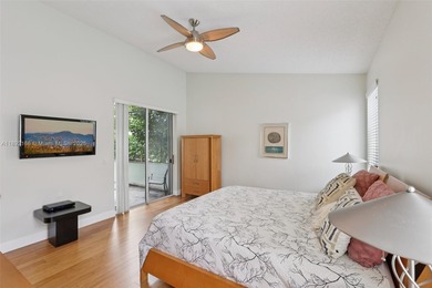 Spacious, meticulously maintained home in a gated community with on Woodmont Country Club in Florida - for sale on GolfHomes.com, golf home, golf lot