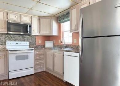 Open floor plan, high ceilings, a true 2Br/2Ba, and new roof in on The Rookery At Marco in Florida - for sale on GolfHomes.com, golf home, golf lot