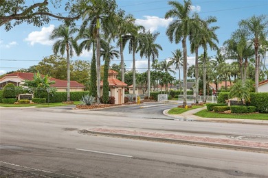 Spacious, meticulously maintained home in a gated community with on Woodmont Country Club in Florida - for sale on GolfHomes.com, golf home, golf lot