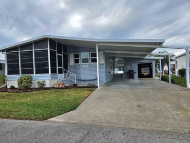 Welcome to this immaculate open concept Palm Harbor with on Big Cypress Golf and Country Club in Florida - for sale on GolfHomes.com, golf home, golf lot