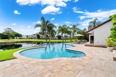 Enveloped within the beauty of its natural setting and defined on Seagate Country Club in Florida - for sale on GolfHomes.com, golf home, golf lot