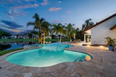Enveloped within the beauty of its natural setting and defined on Seagate Country Club in Florida - for sale on GolfHomes.com, golf home, golf lot