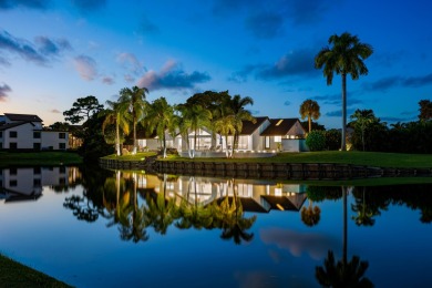 Enveloped within the beauty of its natural setting and defined on Seagate Country Club in Florida - for sale on GolfHomes.com, golf home, golf lot