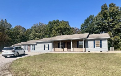 A Quiet Blending of lovely colors and gleaming hardwood and on Eagle Trace Golf Course in Kentucky - for sale on GolfHomes.com, golf home, golf lot