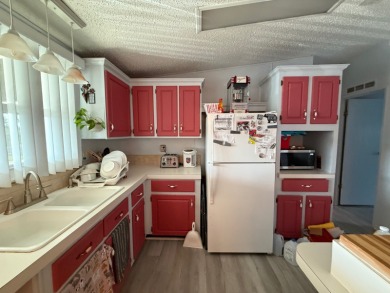 This is the house you have been waiting for with a 2022 Roof on Whisperwood Golf Course in Florida - for sale on GolfHomes.com, golf home, golf lot