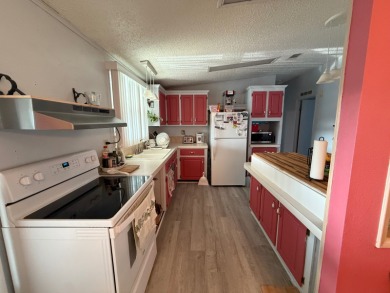 This is the house you have been waiting for with a 2022 Roof on Whisperwood Golf Course in Florida - for sale on GolfHomes.com, golf home, golf lot