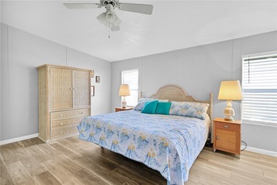 GOLF CART INCLUDED Beautifully updated split-bedroom home on Barefoot Bay Golf Course in Florida - for sale on GolfHomes.com, golf home, golf lot