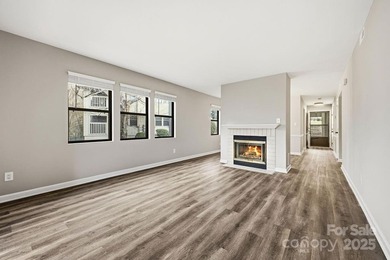 Freshly renovated and truly turnkey, this serene single-level on Asheville Municipal Golf Course in North Carolina - for sale on GolfHomes.com, golf home, golf lot