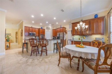 Magnificent 6-Bedroom Pool Home with Golf Course Views in on Magnolia Plantation Golf Club in Florida - for sale on GolfHomes.com, golf home, golf lot