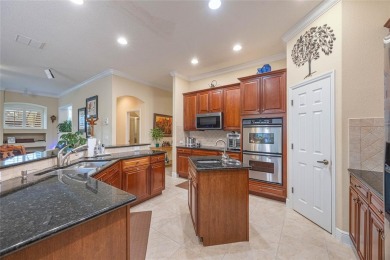 Magnificent 6-Bedroom Pool Home with Golf Course Views in on Magnolia Plantation Golf Club in Florida - for sale on GolfHomes.com, golf home, golf lot