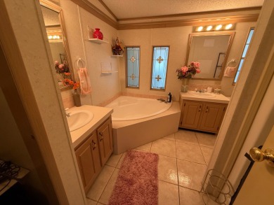 This is the house you have been waiting for with a 2022 Roof on Whisperwood Golf Course in Florida - for sale on GolfHomes.com, golf home, golf lot