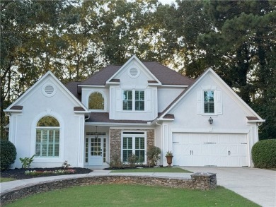 Discover a meticulously designed home that seamlessly blends on Canongate At Olde Atlanta Golf Club in Georgia - for sale on GolfHomes.com, golf home, golf lot